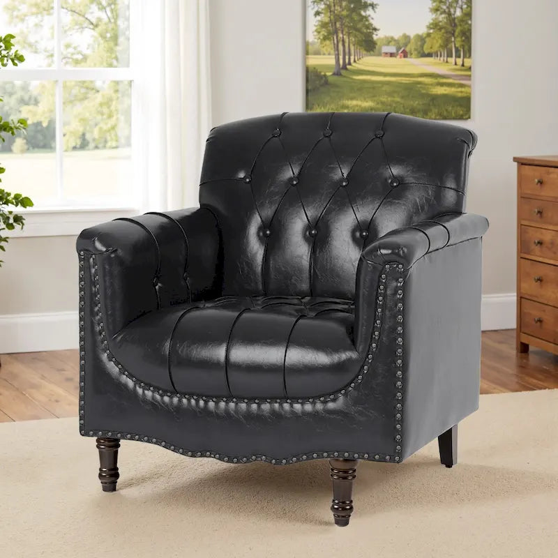 Fauteuil club en similicuir capitonné avec clous décoratifs et pieds tournés en bois