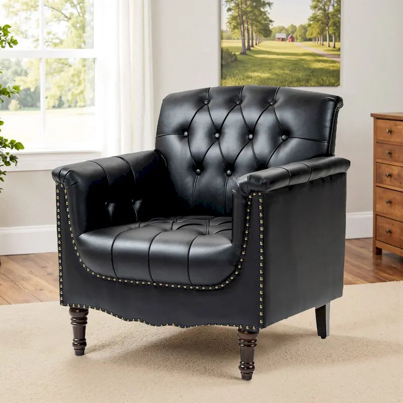 Fauteuil club en similicuir capitonné avec clous décoratifs et pieds tournés en bois