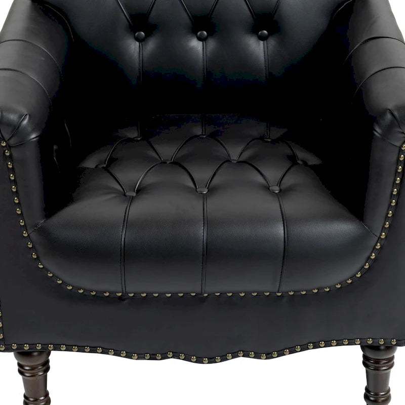 Fauteuil club en similicuir capitonné avec clous décoratifs et pieds tournés en bois