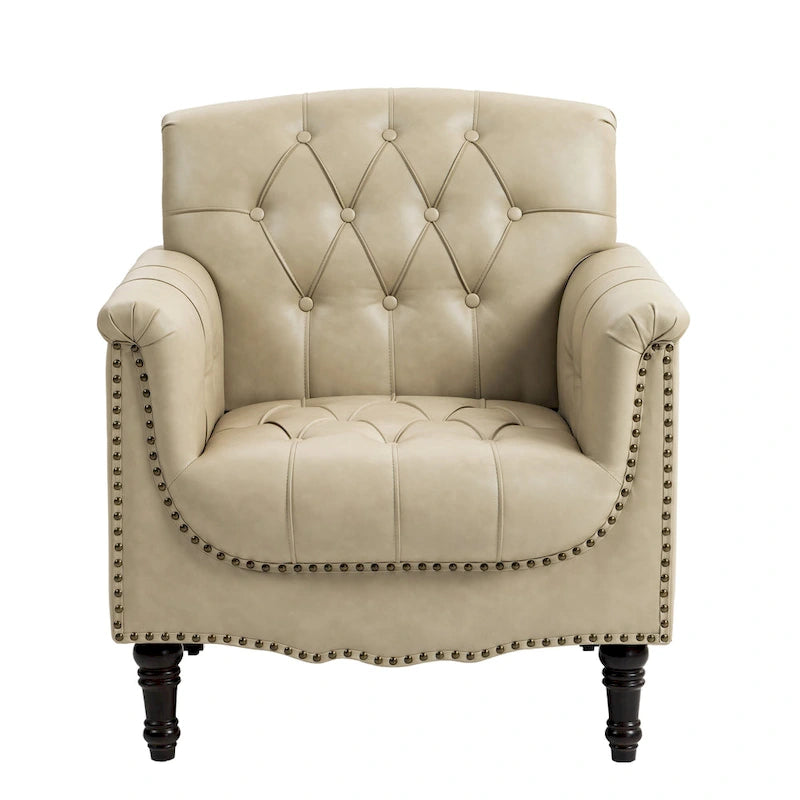 Fauteuil club en similicuir capitonné avec clous décoratifs et pieds tournés en bois