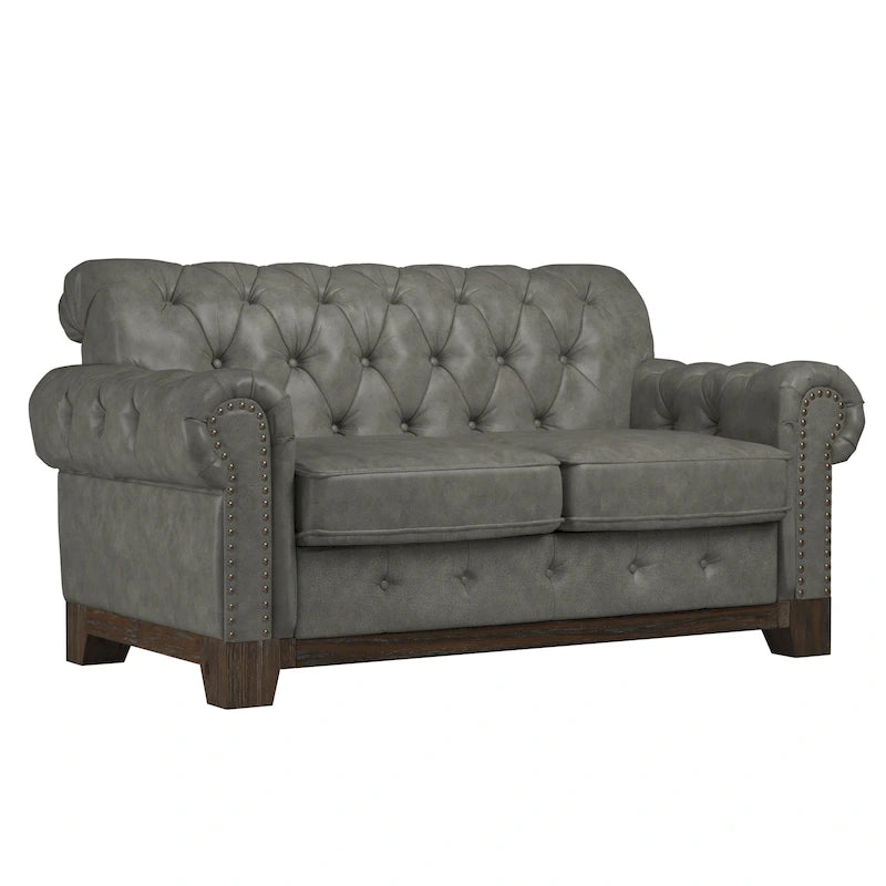Causeuse capitonnée Chesterfield avec accoudoirs roulés et garniture cloutée