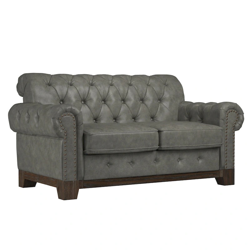Causeuse capitonnée Chesterfield avec accoudoirs roulés et garniture cloutée